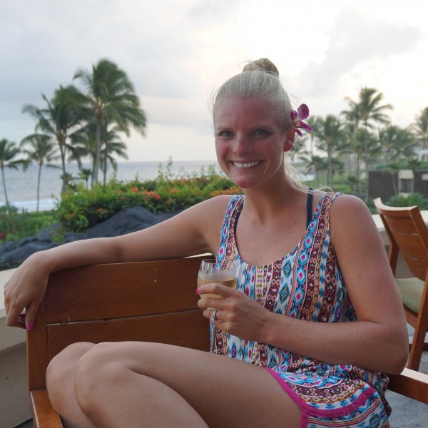 Enjoying drinks at the Grand Hyatt Kauai - shop the romper in the post on DailyKaty.com