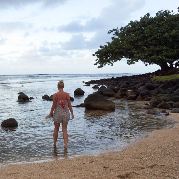 Waiting for sunset at the St. Regis Princeville in Kauai, Hawaii - shop this romper and sunglasses in today's post on DailyKaty.com